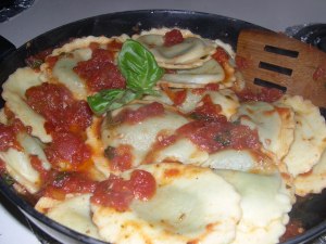 Spinach and ricotta ravioli with Lucini Tomato-Basil sauce